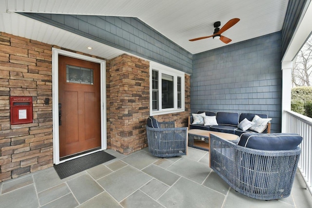 view of patio featuring ceiling fan and an outdoor living space