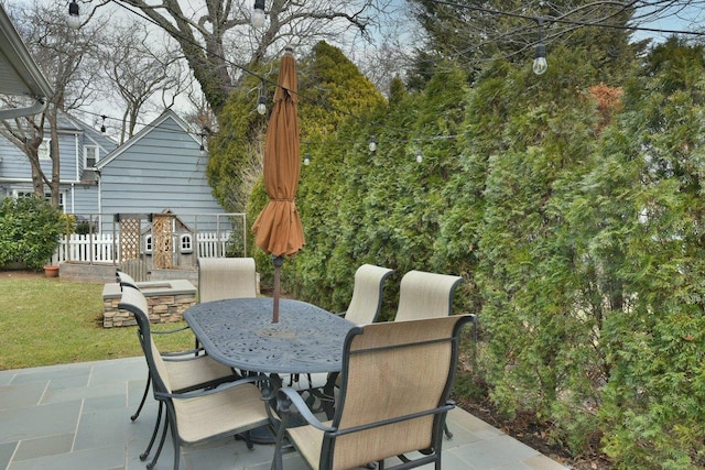 view of patio / terrace with fence and outdoor dining space