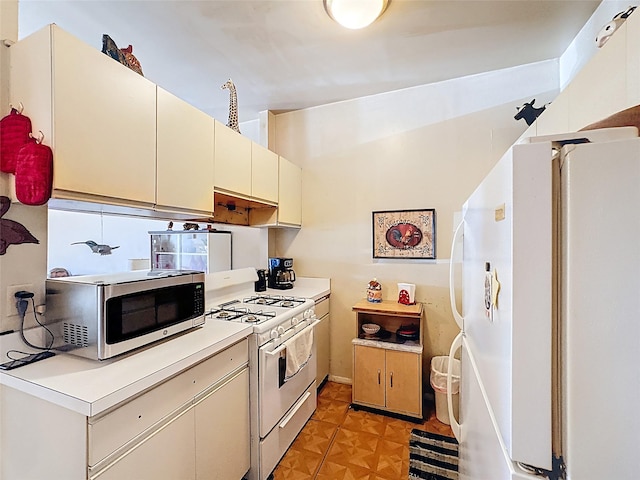 kitchen with white appliances and light countertops