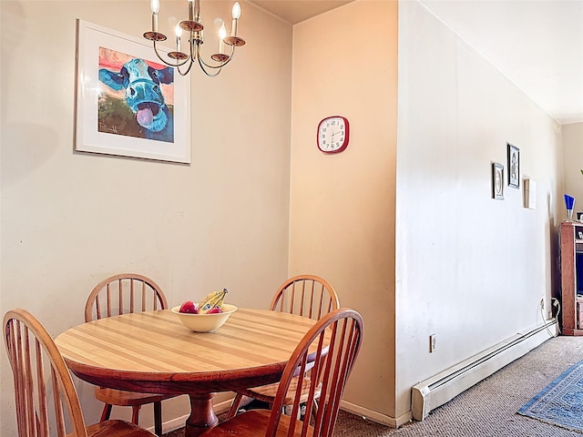 dining area featuring a baseboard radiator, carpet floors, and an inviting chandelier