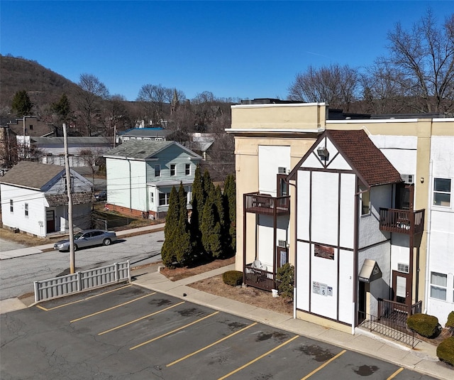 exterior space with uncovered parking