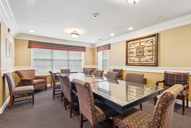 carpeted dining area with baseboards, ornamental molding, and recessed lighting