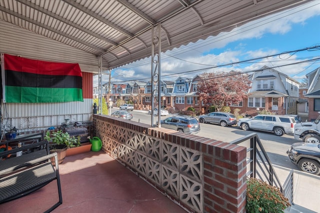 view of patio with a residential view