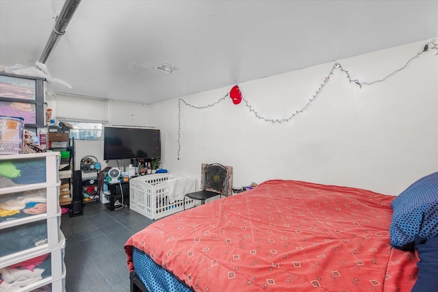 tiled bedroom featuring visible vents