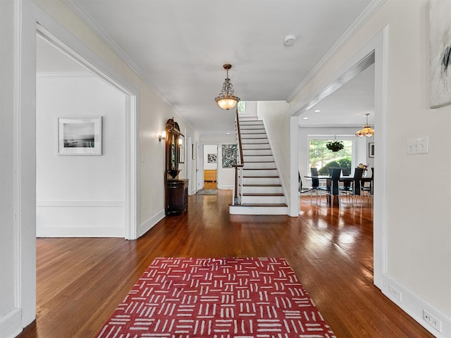 1 Finnegan Ln, Montebello, NY 10901 - entryway featuring wood finished floors, stairway, and ornamental molding