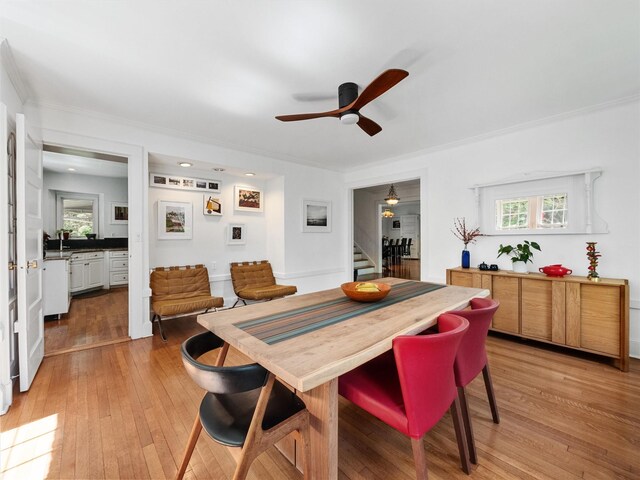 1 Finnegan Ln, Montebello, NY 10901 - dining area featuring stairs, ceiling fan, light wood-style flooring, healthy amount of natural light, and ornamental molding