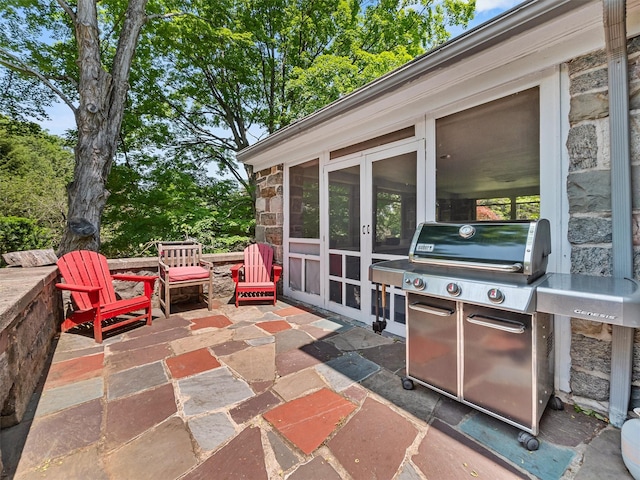 1 Finnegan Ln, Montebello, NY 10901 - view of patio / terrace with grilling area and french doors