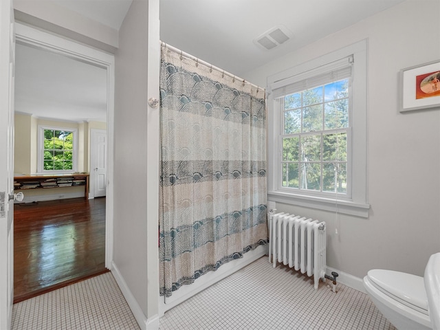 1 Finnegan Ln, Montebello, NY 10901 - bathroom with radiator heating unit and toilet