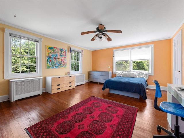 1 Finnegan Ln, Montebello, NY 10901 - bedroom featuring radiator, ornamental molding, wood finished floors, and a ceiling fan