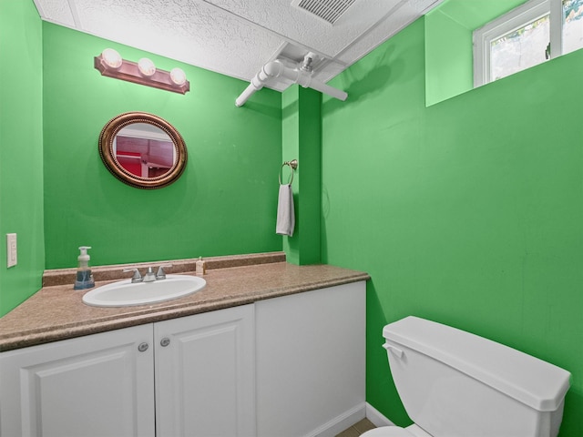 1 Finnegan Ln, Montebello, NY 10901 - bathroom featuring a textured ceiling and vanity