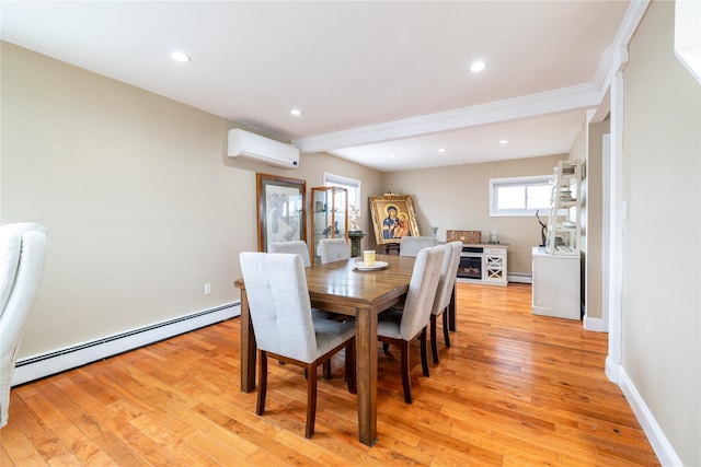 dining area featuring a baseboard radiator, recessed lighting, light wood-type flooring, a wall mounted air conditioner, and baseboards