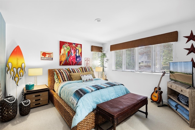 bedroom featuring carpet