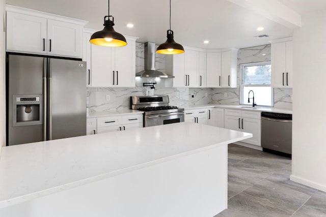 kitchen with stainless steel appliances, tasteful backsplash, wall chimney exhaust hood, and visible vents