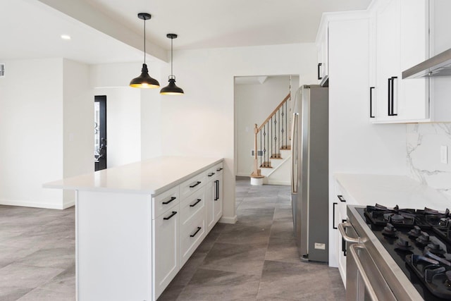 kitchen with white cabinetry, light countertops, ventilation hood, backsplash, and freestanding refrigerator