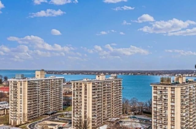 aerial view featuring a water view and a city view