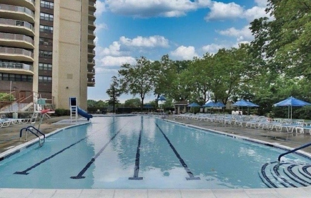 pool featuring a water slide