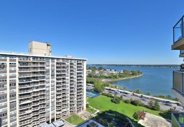 view of building exterior featuring a water view