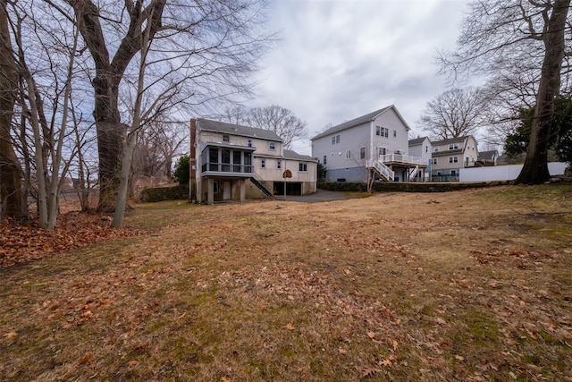 back of property with stairway