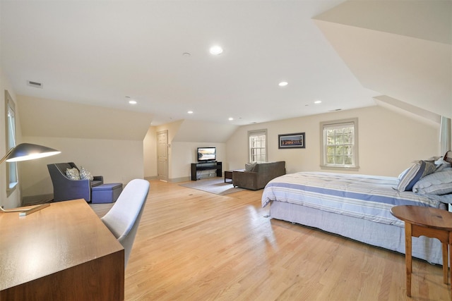 bedroom featuring recessed lighting, visible vents, vaulted ceiling, and light wood finished floors