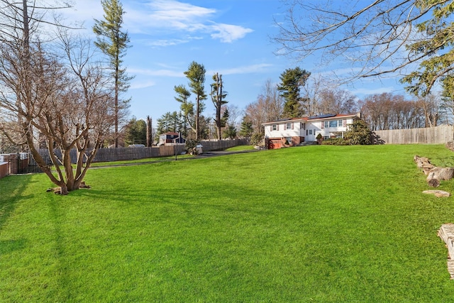 view of yard featuring a fenced backyard