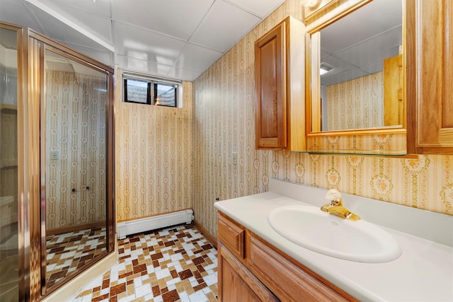 bathroom with wallpapered walls, a stall shower, and a baseboard radiator