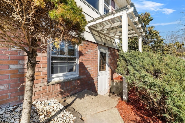 view of home's exterior featuring brick siding