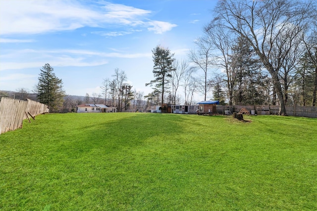 view of yard with fence