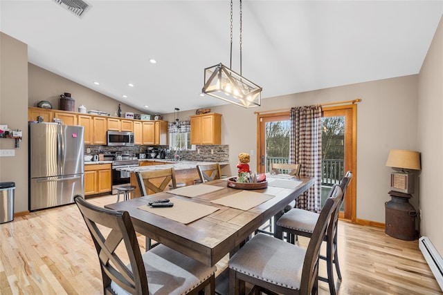 dining space with visible vents, lofted ceiling, recessed lighting, light wood-type flooring, and baseboard heating