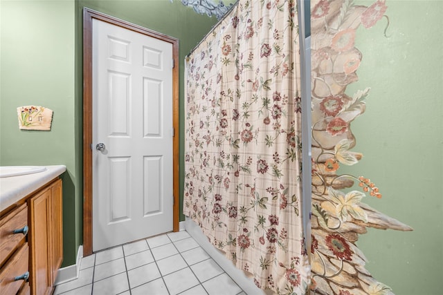 full bathroom featuring tile patterned floors, vanity, and a shower with shower curtain