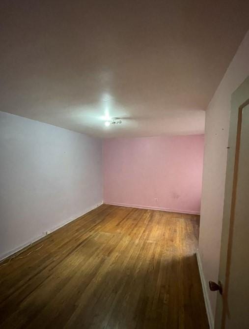 empty room featuring hardwood / wood-style floors