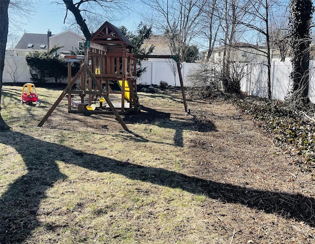 view of play area with a fenced backyard