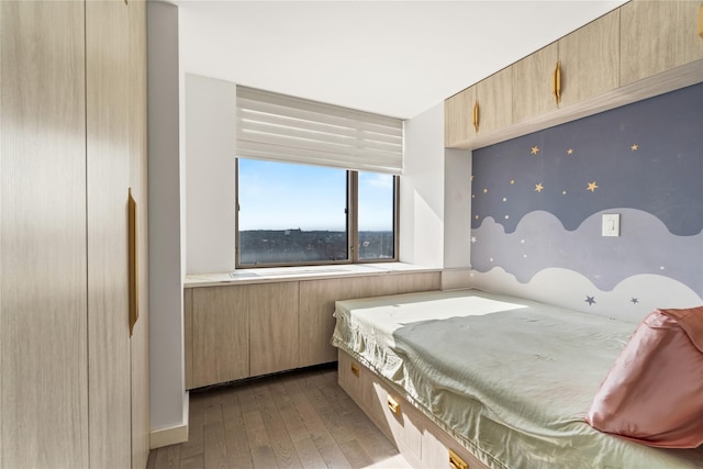 bedroom featuring wood-type flooring