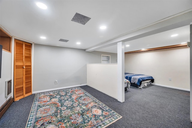 bedroom with carpet floors, baseboards, baseboard heating, and recessed lighting