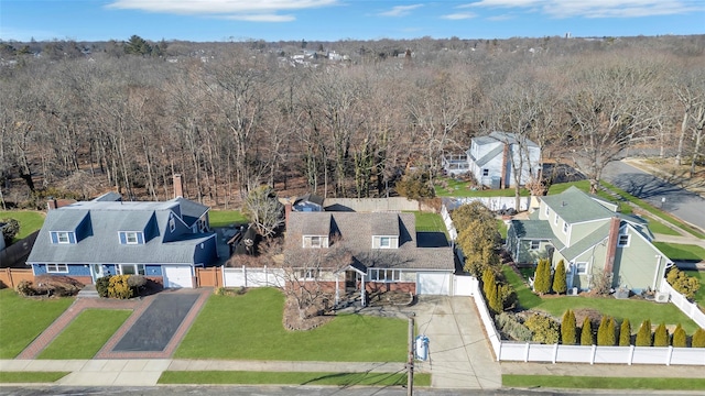 birds eye view of property with a residential view