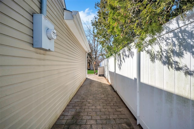 view of property exterior featuring fence