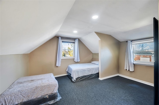 bedroom with lofted ceiling, baseboards, dark carpet, and recessed lighting