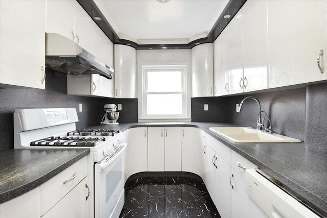 kitchen featuring decorative backsplash, white appliances, extractor fan, and a sink