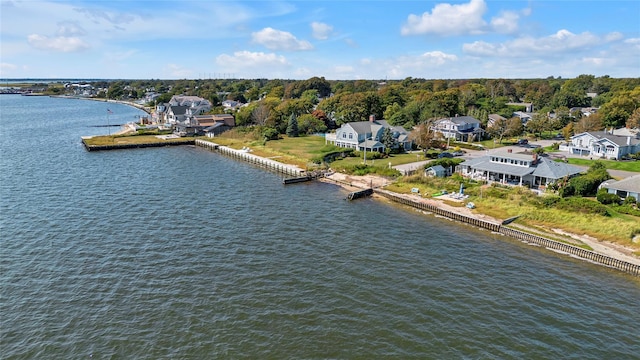 bird's eye view with a residential view and a water view