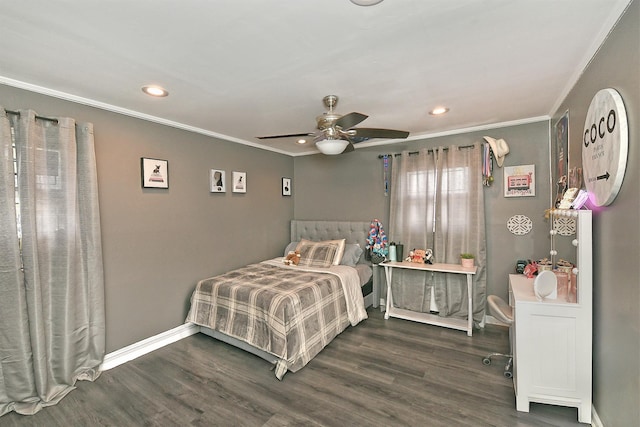 bedroom featuring a ceiling fan, baseboards, crown molding, and wood finished floors