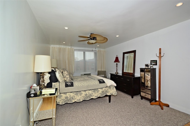 bedroom featuring light carpet, baseboards, a ceiling fan, and recessed lighting