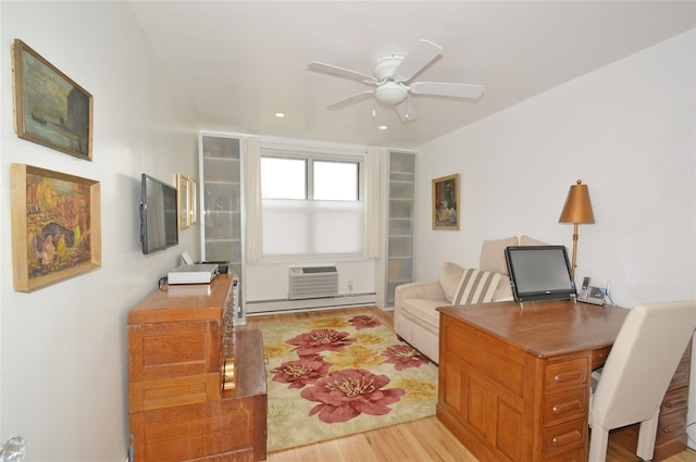 office with ceiling fan, a baseboard radiator, recessed lighting, light wood-style floors, and a wall mounted AC