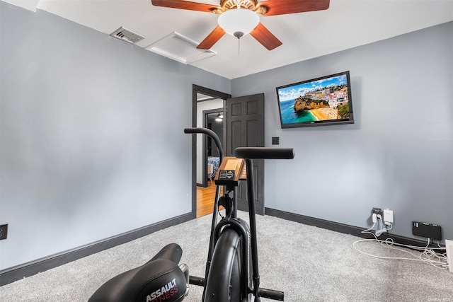 workout room featuring baseboards, light carpet, visible vents, and attic access