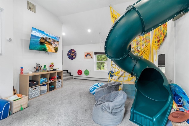 game room with vaulted ceiling, visible vents, baseboard heating, and carpet flooring