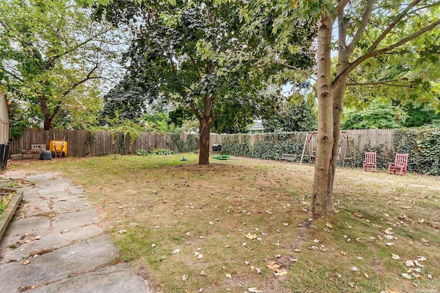 view of yard with a fenced backyard