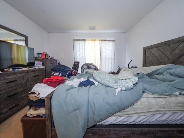 bedroom with visible vents