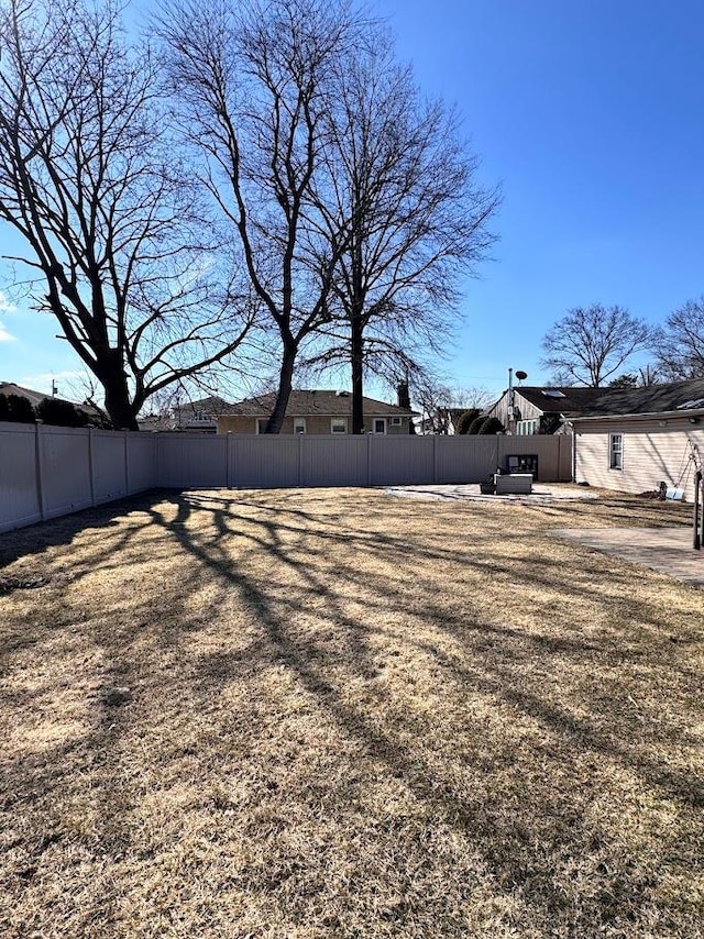 view of yard featuring a fenced backyard