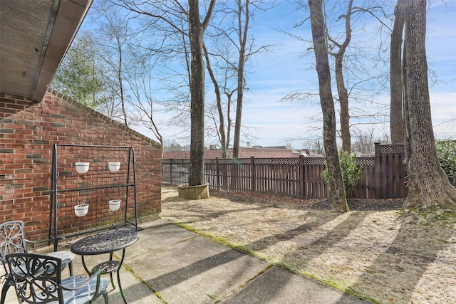 view of patio with fence