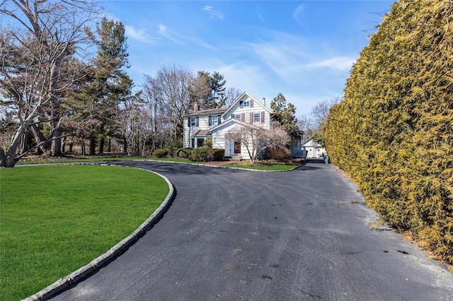 view of road featuring curbs