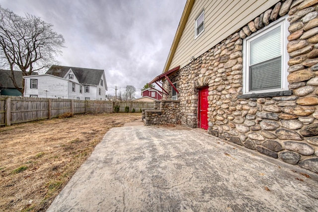 view of yard with a patio area and a fenced backyard