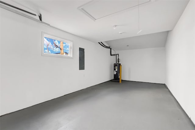 garage with water heater and electric panel